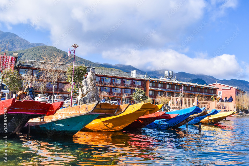 Colorful boats on the lake in Yunnan, China.