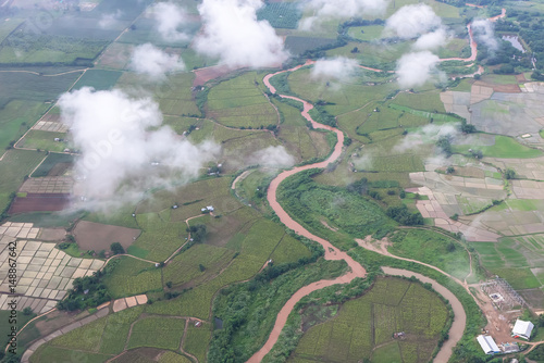 Aerial View of Village landscape and River over Clouds in Chiangdao Thailand   © rbk365
