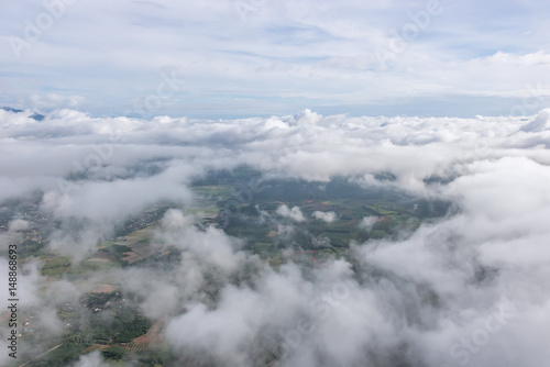 Aerial View of Village landscape and River over Clouds in Chiangdao Thailand  