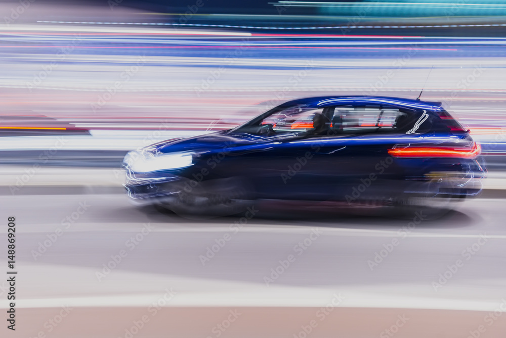 Speeding car at night