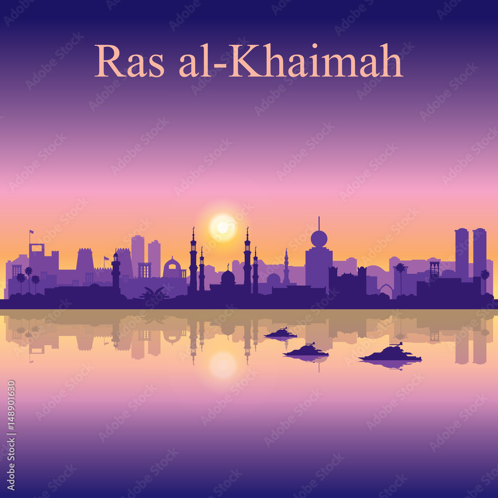 Ras al-Khaimah silhouette on sunset background