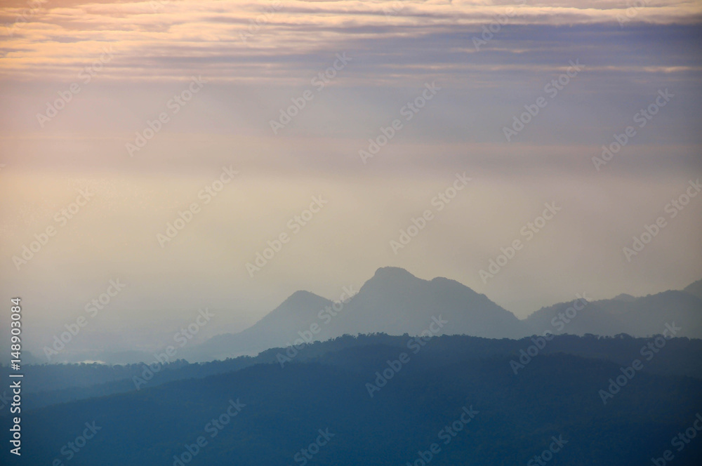 View of the mountains and forest in evening View of the mountains and forest in evening