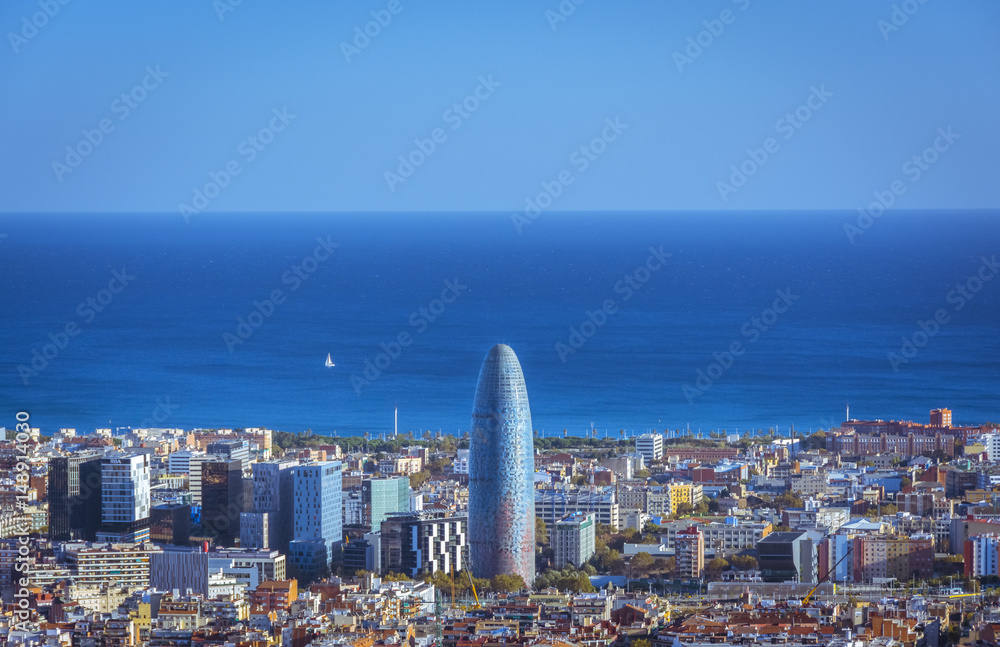 Fototapeta premium View of Barcelona, tower Agbar and the Mediterranean sea