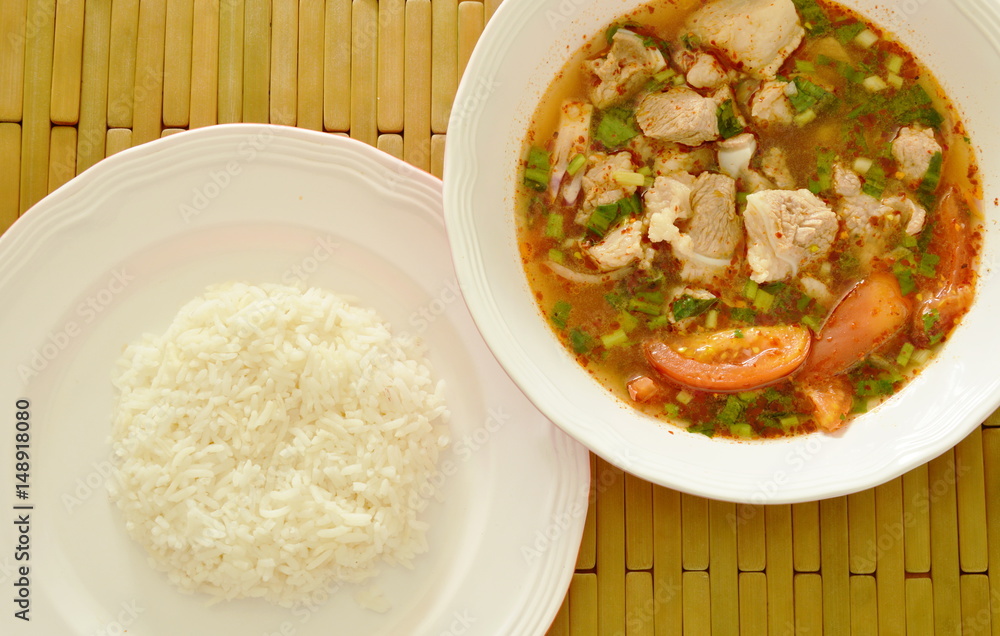 hot and spicy pork bone tamarind and Thai herbs soup eat couple with rice hot and spicy pork bone tamarind and Thai herbs soup eat couple with rice