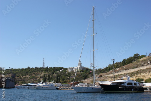 Russia. Crimea. Sevastopol. Ships in the port. Sea blue sky and ships