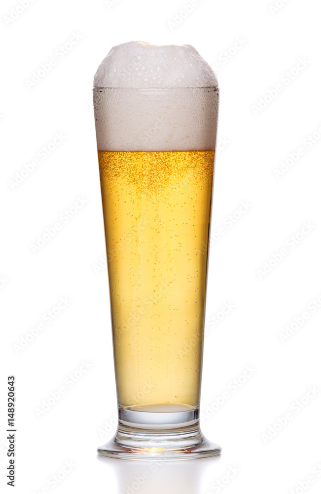 Frosty glass of light beer on white. Frosty glass of light beer on white.