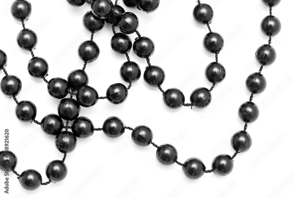 Black beads on a white background Black beads on a white background