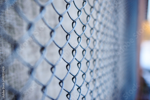 Obraz na płótnie fence with metal grid in perspective w salonie