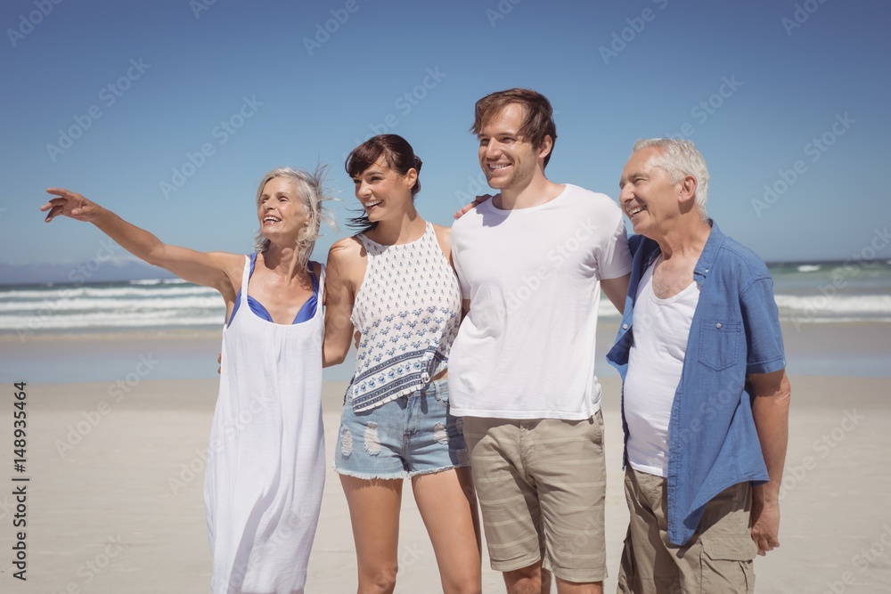 Happy family looking away while standing side by side Happy family looking away while standing side by side