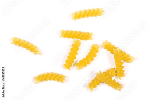 Italian spiral shaped pasta, macaroni, isolated on white background, top view