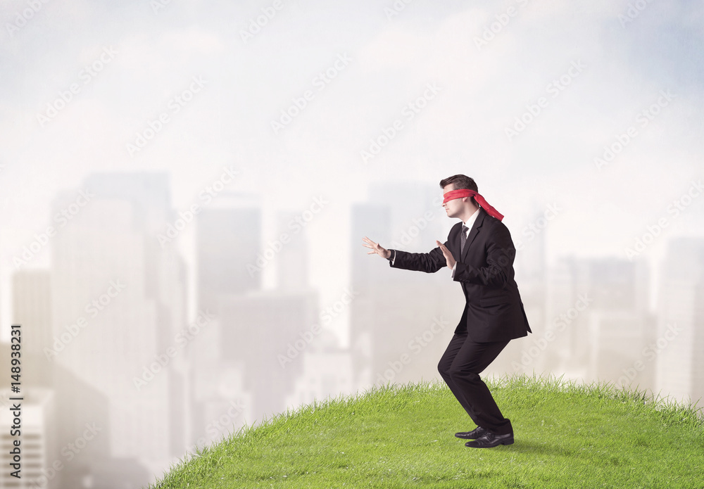 Blindfolded businessman concept Blindfolded businessman concept