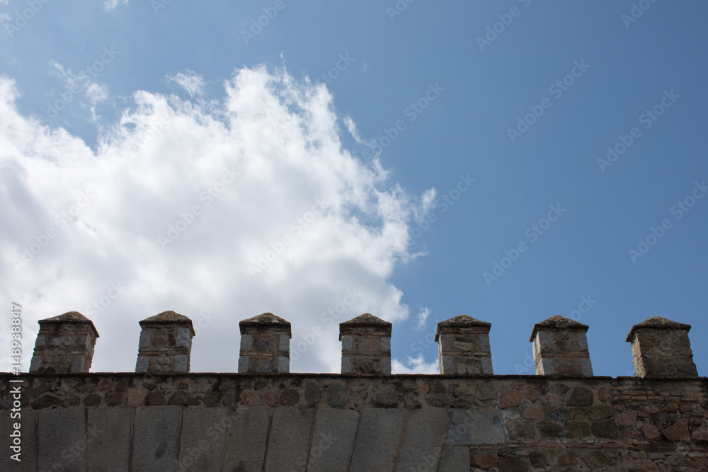 The wall of the fortress and the blue sky