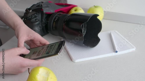 The man holds the phone in his hands and uses navigation, close-up, camera movement. Professional camera