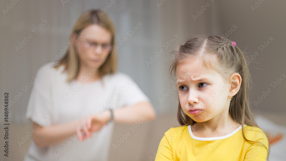 Mother scolds her daughter. Family relationships. The education of the child. Mother scolds her daughter. Family relationships. The education of the child.