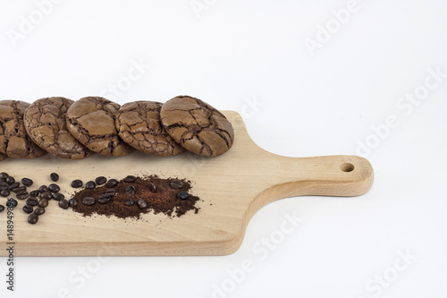 Black Brownie Cookies on wooden chopping board