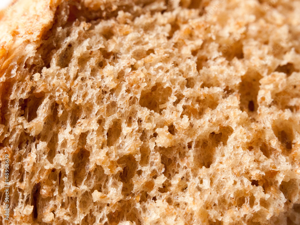 close up texture of soft brown bread close up texture of soft brown bread