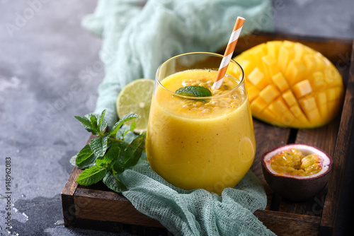 Healthy mango smoothie, exotic vitamin drink, mango shake