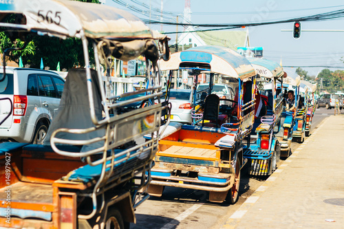 Photos VIENTIANE, LAOS - December 7, 2016: Tuk tuk on the street in Vientiane, Laos