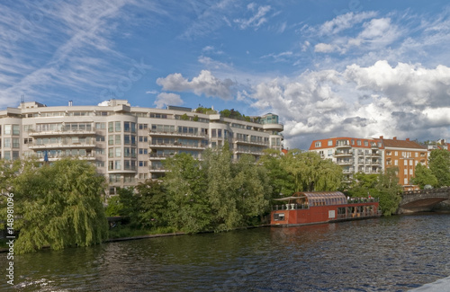 Berlin, Germany - Modern facades of buildings and Old, historic bridge over the river. © MiroslawKopec