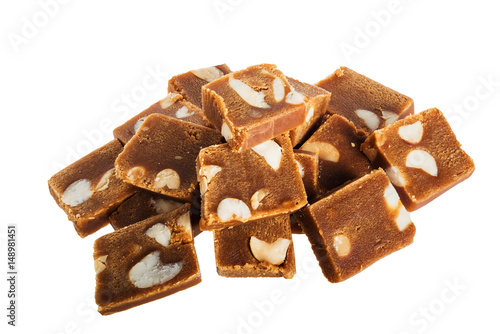 Broken chocolate bar with walnut isolated on white background