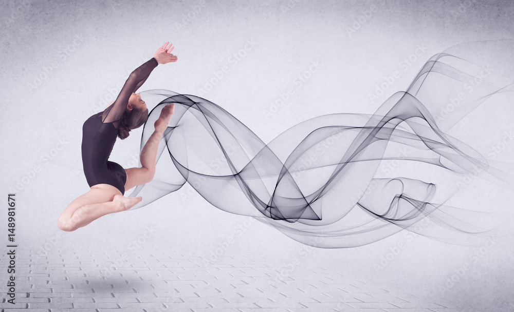 Fototapeta premium Modern ballet dancer performing with abstract swirl