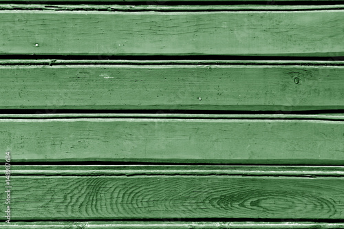 Green color wood wall pattern.