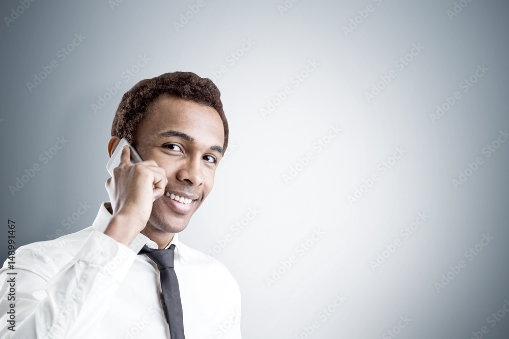 African American businessman with mobile phone African American businessman with mobile phone