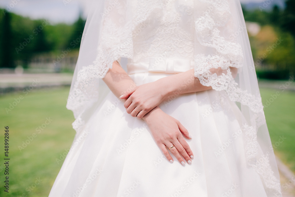 bridal hand with wedding ring