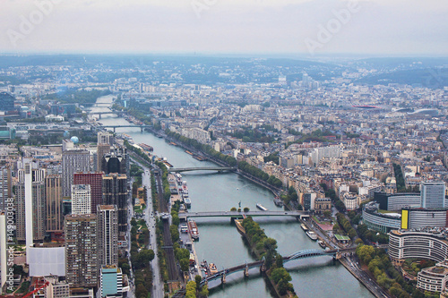 Panoramic view on paris city and seine river from the top of eiffel tower, france