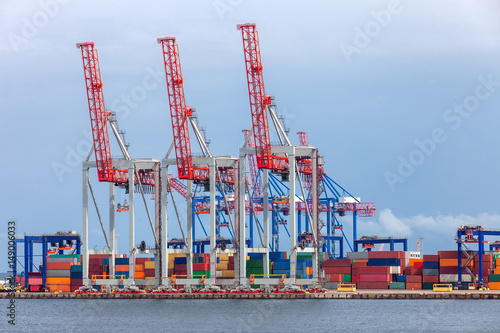 Sea port cargo crane and container.