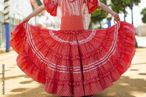Little girls in flamenco style dress at the Sevilla, Spain. Seville's April Fair on April
