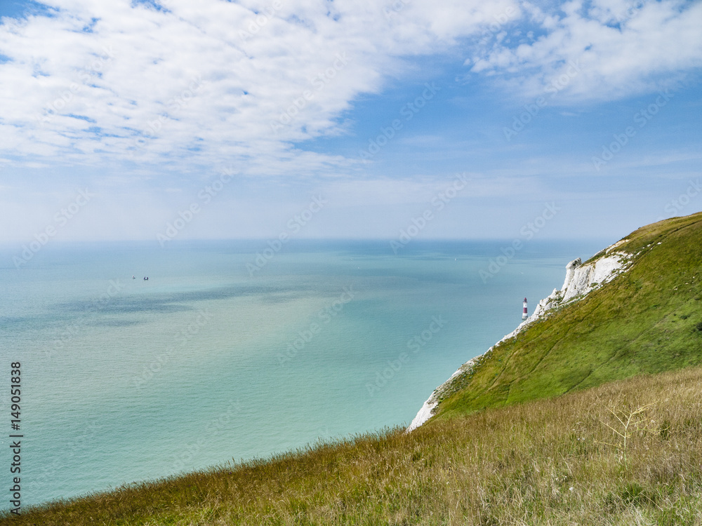 Lighthouse and cliffs at Beachy Head, UK.