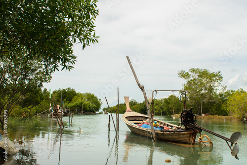 Fishing boats at fishing village © tippapatt