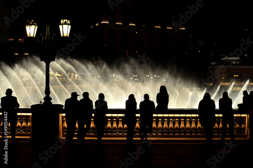 People enjoying dancing waters in Las Vegas photo