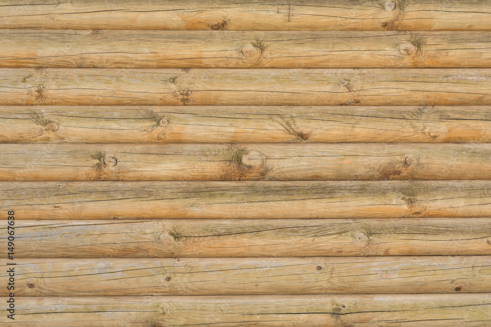 Texture of a ancient wall of wooden logs, abstract background Texture of a ancient wall of wooden logs, abstract background