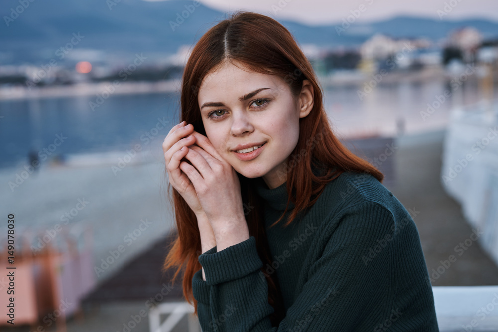 romantic woman standing on the beach, sea breeze, evening romantic woman standing on the beach, sea breeze, evening