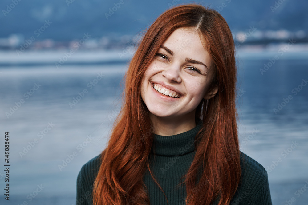 woman with a charming smile, nature, sea...