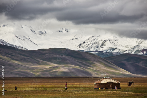 Fotografiet Nomad yurt in the mountain valley of Central Asia