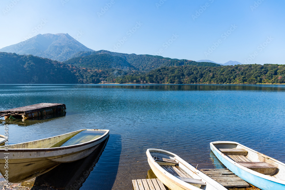 Mount Kirishima and lake with boat