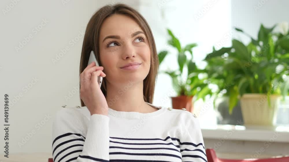 Beautiful Young Woman Talking on Smartphone Beautiful Young Woman Talking on Smartphone
