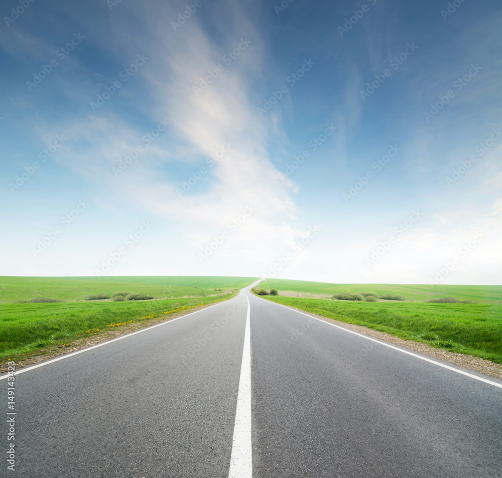 Road and cloudy sky. Beautiful natural concept and idea of travel