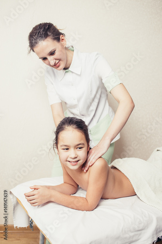 funny little girl with a massage Stock Photo | Adobe Stock