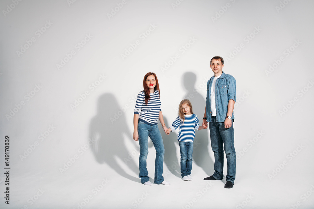 Happy family portrait standing on white background isolated
