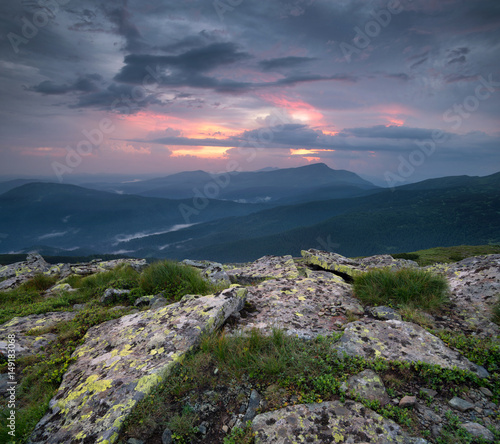 Mountain panorama during sundown. Beautiful natural panoramic landscape in the summer time