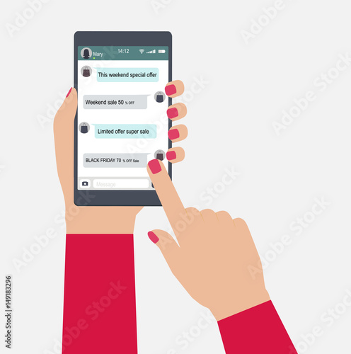 Hands holds mobile phone with messaging in app. Concept of shopping in social network