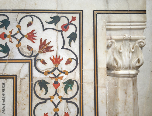 exterior trim of gem stones on white marble background at mausoleum Taj Mahal, Agra, Uttar Pradesh state, India
