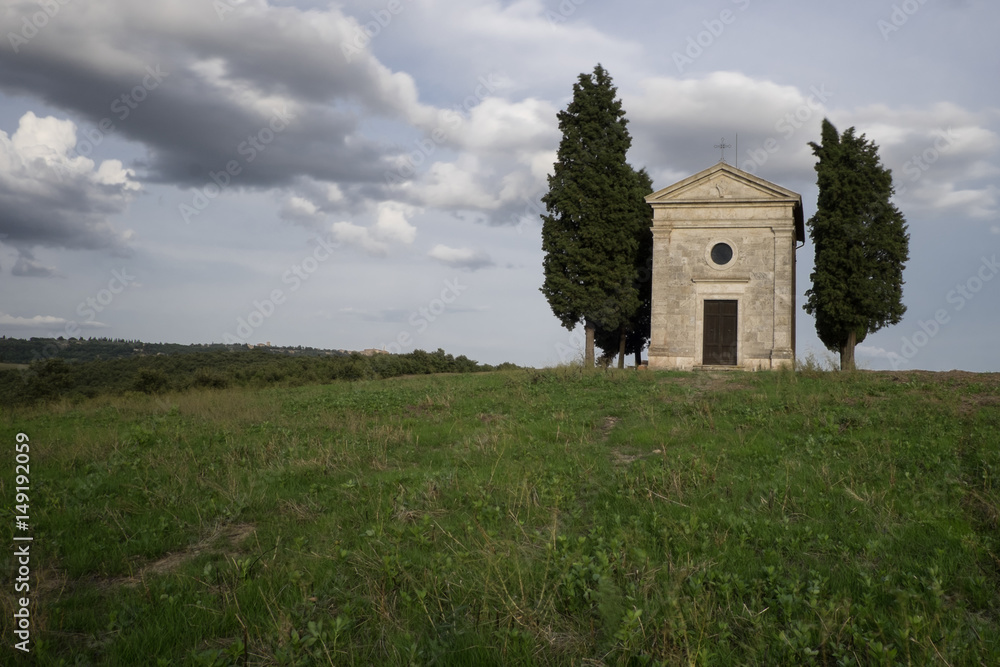 The chapel of the Vitaleta Madonna is a small sacred building is located on the top of a hill at Vitaleta on the road from San Quirico d'Orcia to Pienza