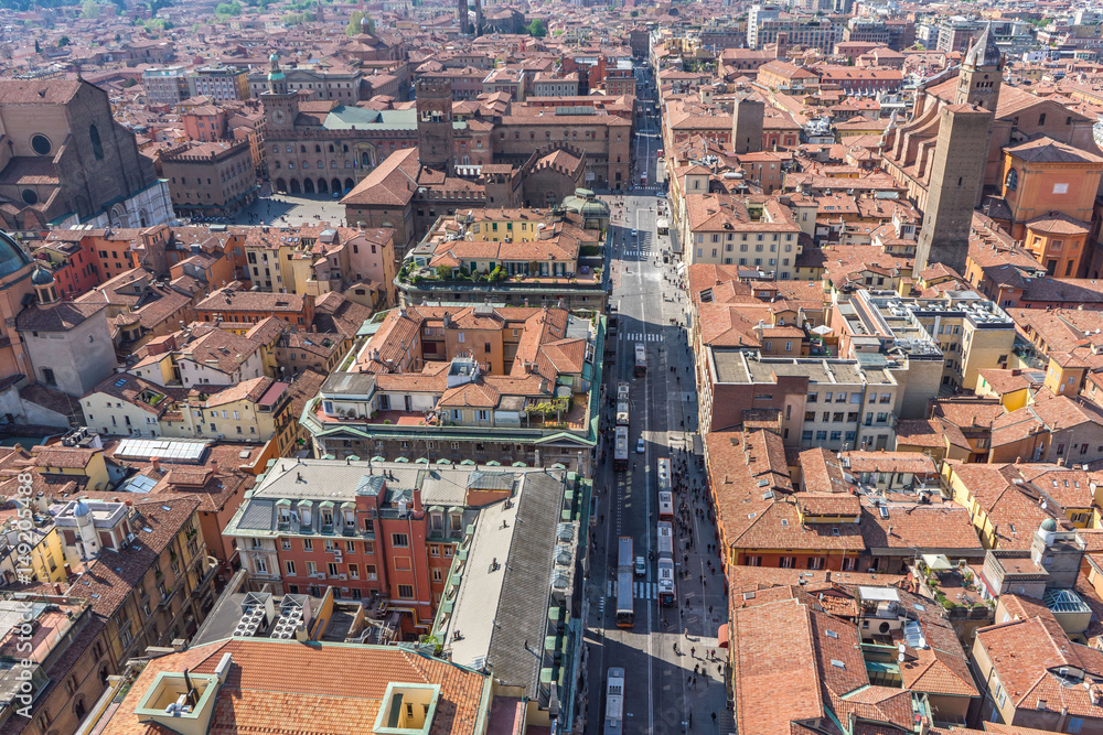 Aerial view of Bologna downtown with Maggiore Square, City Hall and Rizzoli Street from Asinelli tower, Italy