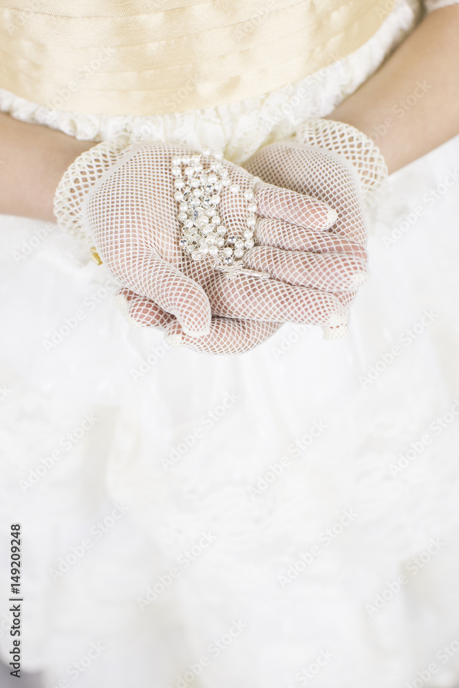 Hands of girl going first communion Hands of girl going first communion
