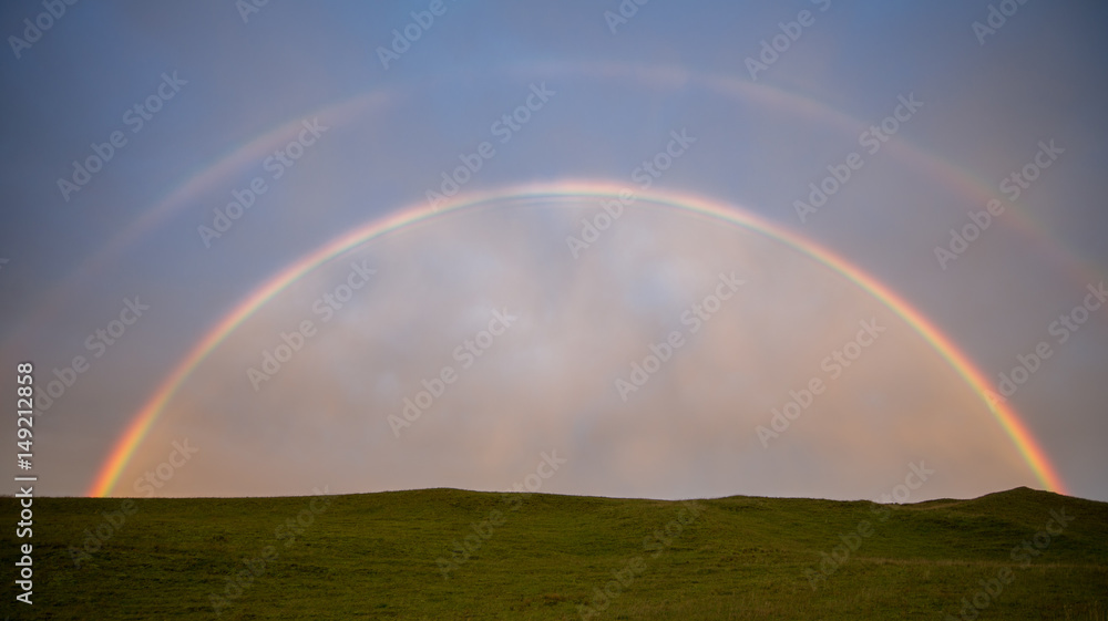 Double rainbow on a field Double rainbow on a field